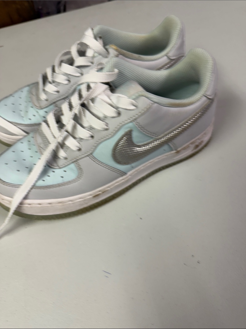 Nike Women’s Low-Top Sneakers in Light Blue and Silver